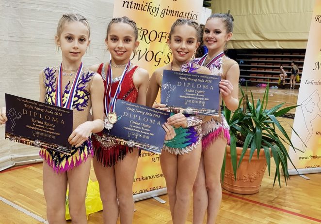 Gimnastele de la ritmică au urcat pe podium, în Serbia
